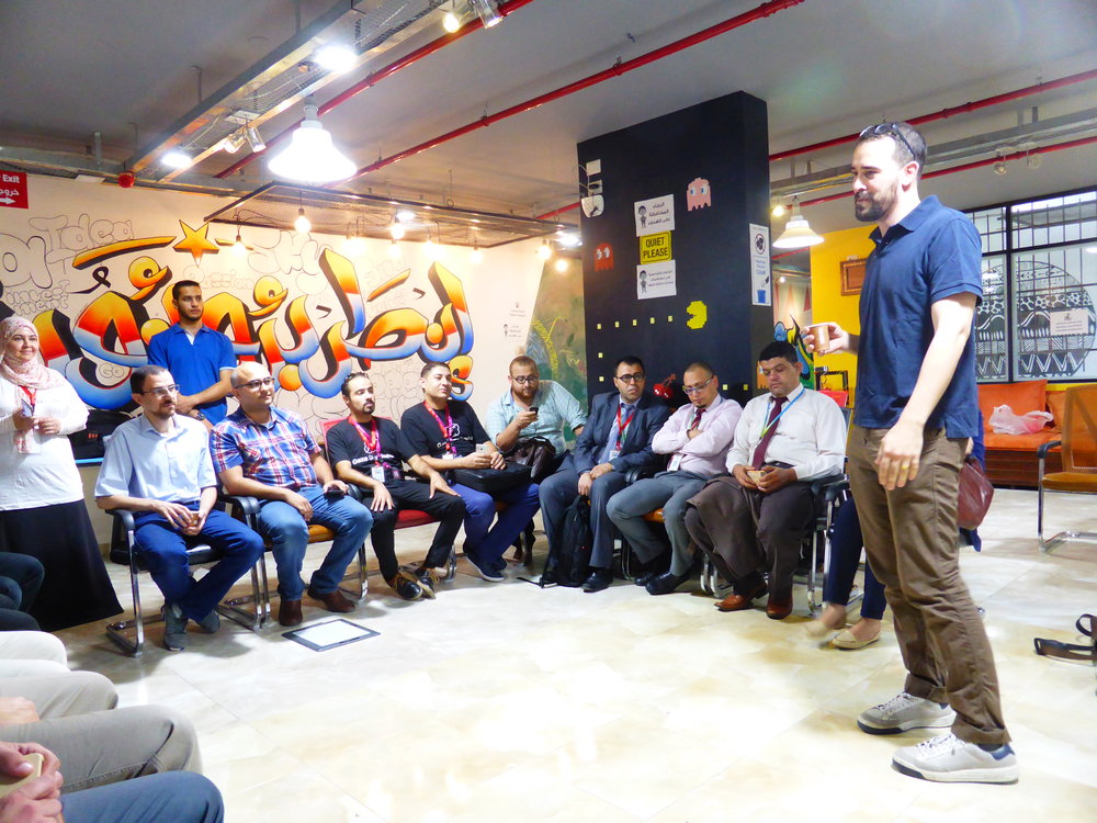 Ryan chairing a breakfast meeting for all the actors in Gaza's tech ecosystem at the GSG offices